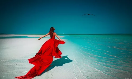 أهم تأويلات ابن سيرين لرؤية الفستان الاحمر في الحلم للعزباء